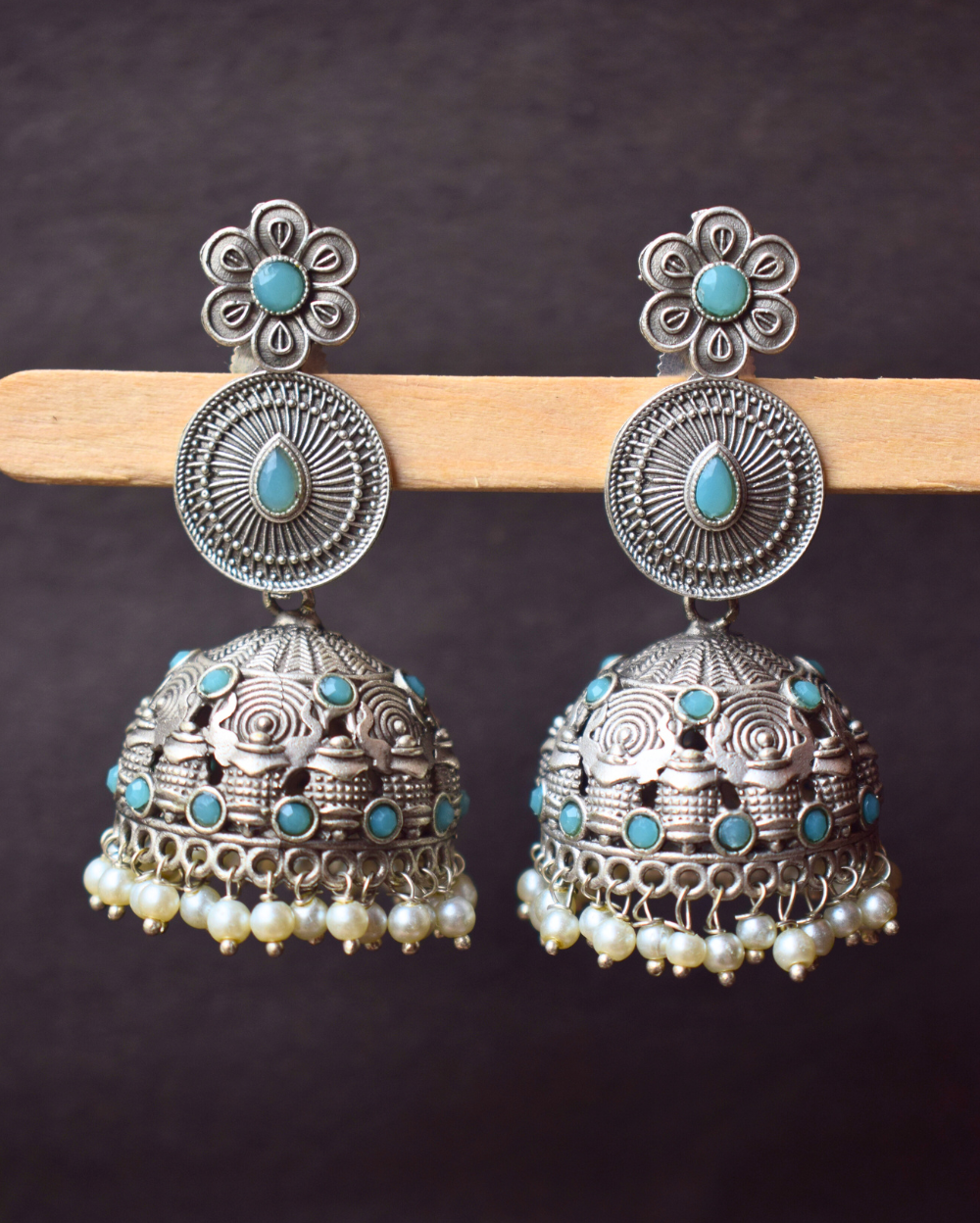 Oxidised German Silver Jhumka's with Sky Blue Crystals